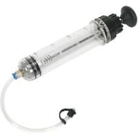 Clear Sealey syringe with black plunger, 200ml capacity, transparent body, and attached flexible tube for fluid inspection.