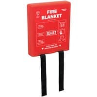 Red Sealey fire blanket with white text and icons, black pull tabs, measuring 1.1 x 1.1m.