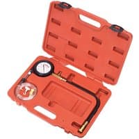 Orange Sealey diesel compression gauge kit with black hose, pressure gauge, and red case.