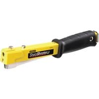 Yellow Stanley heavy-duty hammer tacker with black rubber grip and metal head.