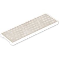 White rectangular finishing stone with textured surface and small diamond pattern.