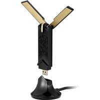 Black ASUS USB-AX56 WLAN adapter with dual gold antennas on a black stand.