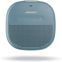 Blue Bose SoundLink Micro speaker with rounded edges, logo on top, and perforated front grille.