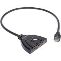 Black Manhattan HDMI switch with three ports, manual button, and integrated 58cm cable, compact triangular design.