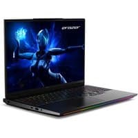 Black MEDION ERAZER Beast 16 laptop with illuminated keyboard and futuristic graphic on screen.