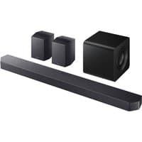Samsung HWQ930F soundbar set with sleek black bar, two rear speakers, and a cube-shaped wireless subwoofer.