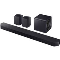 Black Samsung HWQ990F soundbar with two rear speakers and a wireless subwoofer, sleek and modern design.