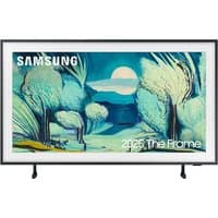 Samsung 43" LS03F The Frame 4K QLED Smart TV with thin black bezel, displaying art of trees and moonlit landscape.