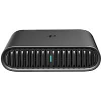 Black TP-Link AX1500 Wi-Fi 6 travel router with vented front grille and compact rectangular design.