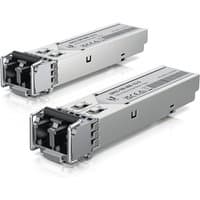Silver Ubiquiti network transceiver module with black connectors and printed labels, set of two.