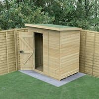 Black grid-patterned plastic shed base kit for 6x4 sheds, designed for stability and drainage on grass or soil.