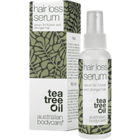 White bottle of Australian Bodycare Hair Loss Serum with green leaf pattern and matching box, 100 ml.