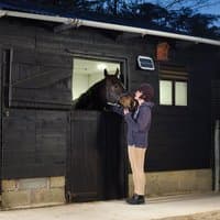 Hubi Work 32 Solar Light, white LED bulb with black solar panel charger, compact design for outdoor use.