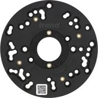 Black Trend UNIBASE/150 router sub-base with multiple holes and brass inserts, circular design, and central opening.