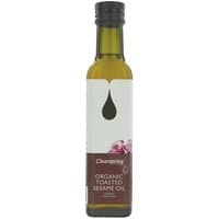 Clearspring Organic Toasted Sesame Oil in a 250ml dark glass bottle with a black cap and white label.