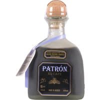 Patrón XO Cafe Coffee Liqueur bottle, dark glass, cork stopper, purple ribbon, and gold-accented black label, 70cl.