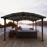 Dark gray Palram Canopia Tucson 5000 gazebo with arched roof and open sides on wooden deck.