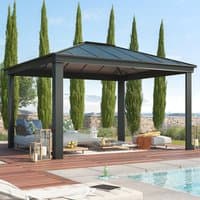 Grey Palram Canopia Dallas 4300 garden gazebo with a sloped roof and sturdy square posts on a wooden deck.