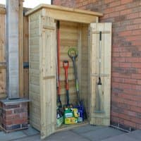 Tall wooden garden storage shed with double doors, shiplap design, and pent roof, housing tools and garden supplies.