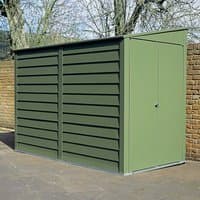 Green metal garage with horizontal panels, secure door, and sloped roof, designed for motorcycle storage.