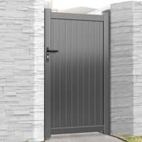 Grey Devon Premium Metal Side Gate with vertical panel design, black handle, and modern frame between stone pillars.