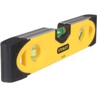 Yellow Stanley torpedo level with black rubber ends, magnetic base, and three bubble vials for horizontal and vertical leveling.