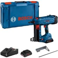 Bosch blue and black cordless concrete nail gun with two ProCore 4Ah batteries, charger, and XL-BOXX case.