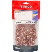 Copper clout nails in a clear 1kg TIMCO bag with red and blue label, visible flat heads and smooth shanks.