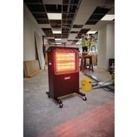 Black Draper infrared cabinet heater with glowing orange elements, mounted on wheels in a construction setting.