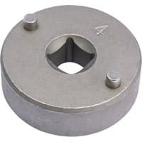 Round silver brake piston wind-back tool with two protruding pins and a central square hole.