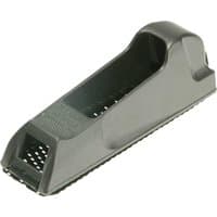 Gray Stanley metal body surform block plane with ergonomic handle and perforated grater-like surface.