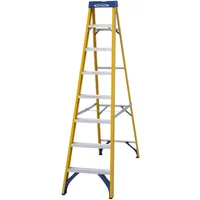 Yellow Werner 8 tread fibreglass swingback ladder with blue top and non-slip steps.