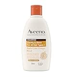 Aveeno shampoo bottle, white with orange cap, apple cider vinegar blend label, 300ml, for soothing dry, itchy scalp.