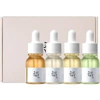 Hanbang Serum Discovery Kit with four 10 ml dropper bottles in amber, clear, white, and green, by Beauty of Joseon.