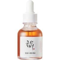 Beauty of Joseon Revive Serum in clear bottle with white dropper, amber liquid, and Korean script on white label.