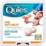 Caswell-Massey Quies Earplug Natural Wax, 8-Pairs in a blue and white box with sleeping couple image.