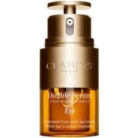 Gold Clarins Double Serum Eye 20ml bottle with pump dispenser and clear lower section showing amber liquid.