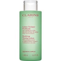 Green Clarins Purifying Toning Lotion bottle, 400ml, with white cap and red text detailing ingredients and benefits.