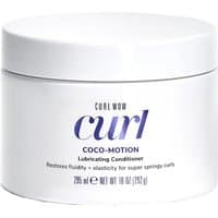 White jar of Color Wow Curl Coco-Motion Lubricating Conditioner, 295ml, with blue text and sleek minimalist design.