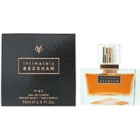 David Beckham Intimately Men 75ml, clear glass bottle with amber liquid, black textured box with gold accents.
