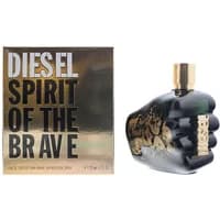 Black fist-shaped Diesel Spirit Of The Brave Eau De Toilette bottle with gold accents, next to gold and black box.