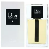 Clear glass bottle of Dior Homme Eau De Toilette with black cap and label, next to matching white box.