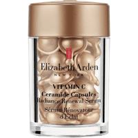Gold Elizabeth Arden Ceramide Vitamin C Capsules in clear jar with gold lid, 30 pieces.