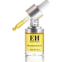 Emma Hardie Brilliance Facial Oil 30ml, clear bottle with gold oil, silver dropper cap, and EH logo.