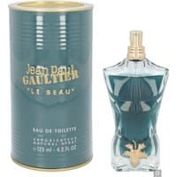 Teal torso-shaped bottle with gold cap, next to matching teal cylindrical box, labeled "Jean Paul Gaultier Le Beau."
