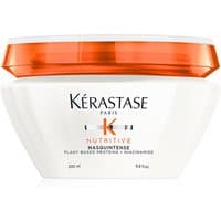 White Kérastase Nutritive Masquintense jar with orange lid, featuring black text and logo on the front.