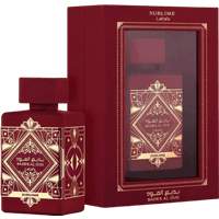 Red Lattafa Bade'e Al Oud Sublime EDP bottle with gold geometric patterns, matching red box with clear front panel.