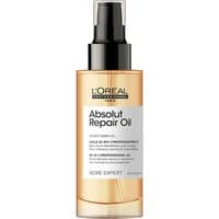 Gold bottle of L'Oréal Professionnel Absolut Repair 10-in-1 Leave In Oil with black pump and white label.