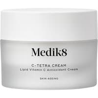 Medik8 C Tetra Cream 50ml in a frosted jar with a white lid, featuring black text and minimalist design.