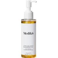 Medik8 Lipid Balance Cleansing Oil 140ml, clear bottle with white pump and black text label.